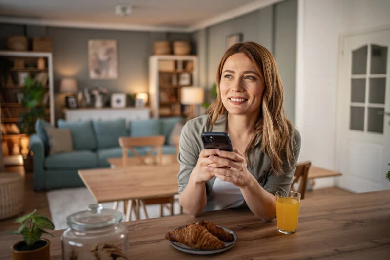 Woman on cell phone at home